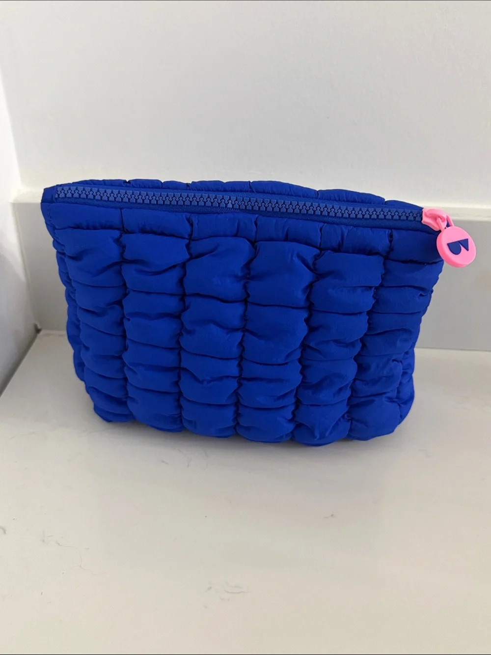Sephora x Ultra Violette puffer cosmetic bag & sunscreen